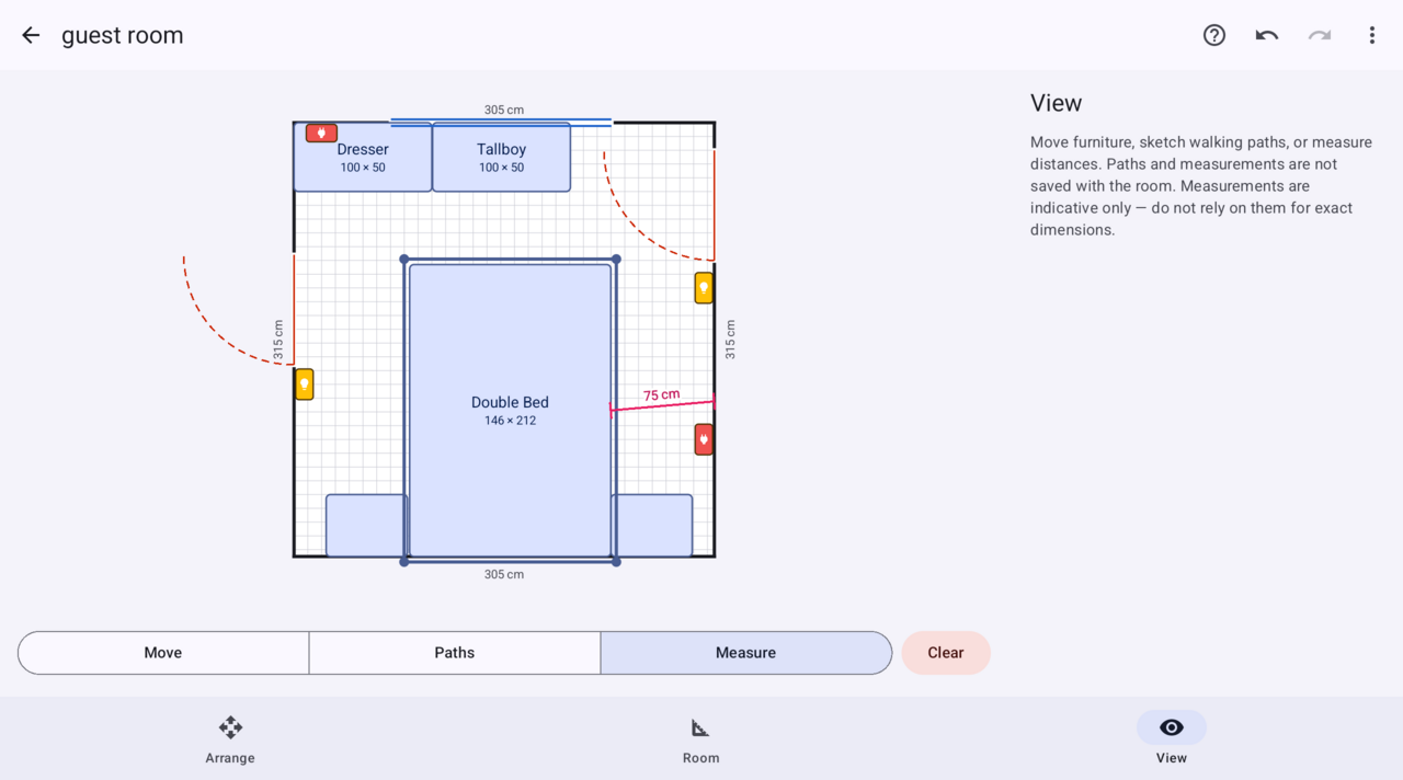 The measure tool showing a 75 cm gap between the bed and the wall